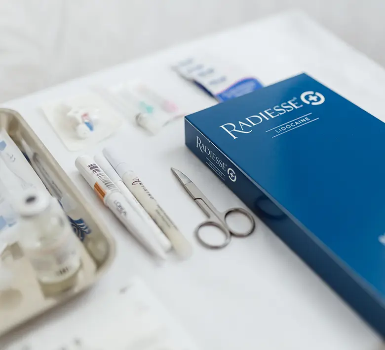 Radiesse collagen bio-stimulator and treatment instruments prepared on a tray